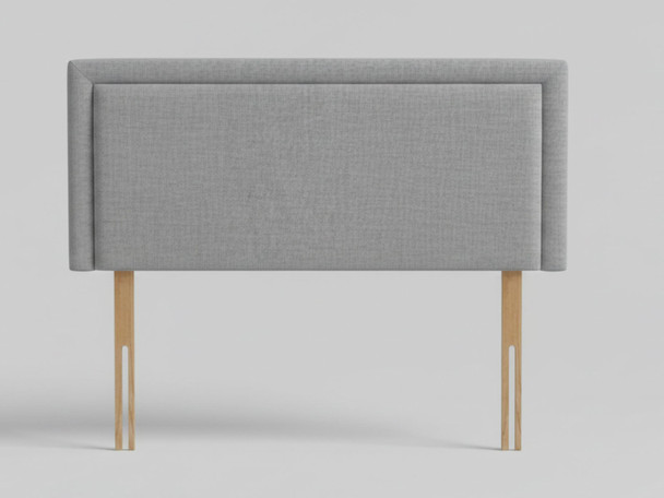 Upgrade your bedroom decor with the Orion Bed Headboard. Crafted in the UK, it offers luxurious fabrics and custom sizes for every sleeper's needs.