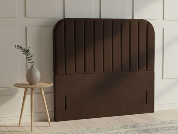 Upgrade your bedroom with the Paloma Floor Standing Headboard. Its striking design and handmade quality ensure a luxurious touch for a restful night's sleep.