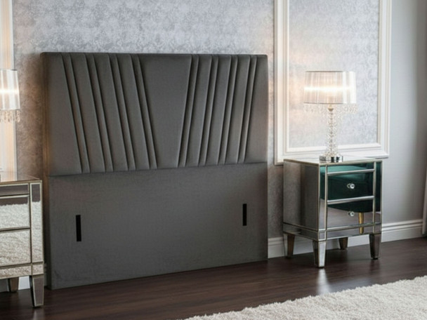 Elevate your sleep space with the Amity Floor Standing Headboard. Handmade in the UK, it offers stunning design, customizable heights, and luxurious fabric options.