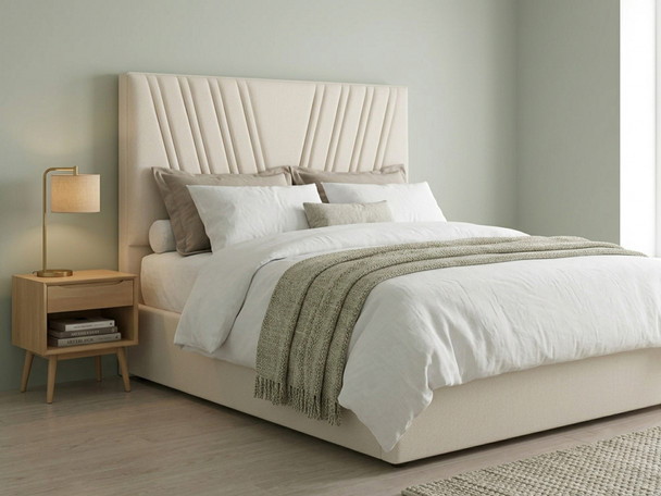 ​A complete view of the Ivory Atlanta fabric headboard paired with a fully dressed bed, demonstrating how the textured, off-white material creates a cozy, inviting, and finished bedroom environment.