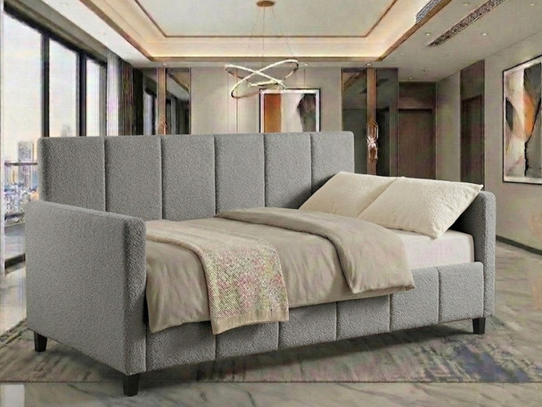 Aspen Day Bed upholstered in modern grey boucle fabric, featuring fluted accent lines on the backrest. A handcrafted luxury sleeper sofa made in Birmingham by Hush My Bed.