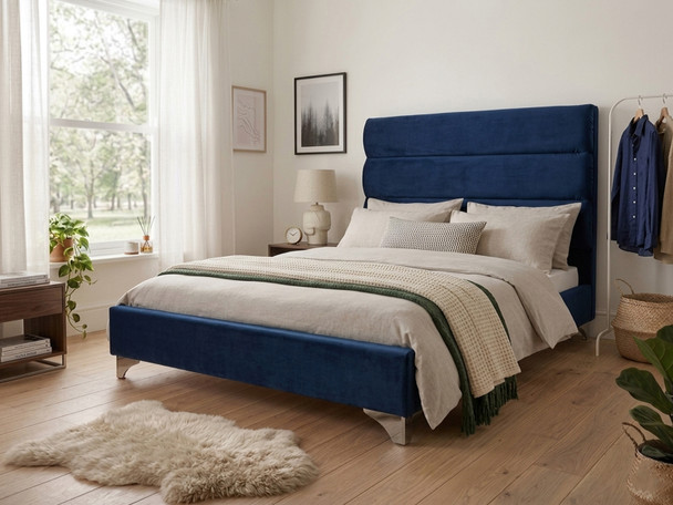 Modern Bruna Upholstered Bed frame in a vibrant blue velvet, highlighting the deep horizontal textured panels on the statement headboard and sleek base