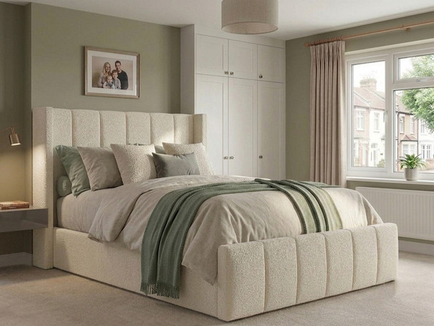 Martina Ottoman Storage Bed Frame upholstered in soft Ivory Atlanta fabric, featuring a tall winged headboard and footboard with fluted vertical accents.