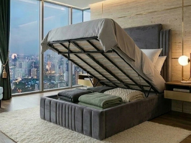 Grey fabric upholstered Ottoman bed frame by Hush My Bed – handcrafted luxury storage bed with vertical fluted headboard.