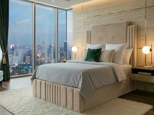 Beige fabric upholstered Ottoman storage bed – premium handcrafted UK-made bed frame with high-capacity storage.