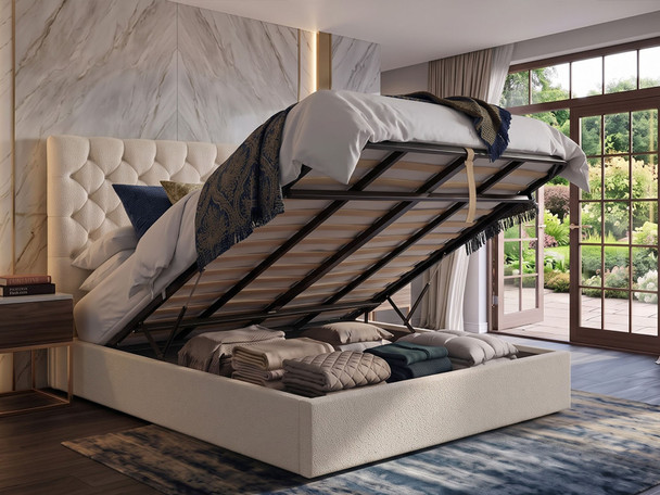 Luisa ottoman bed in Ivory Atlanta Soft Teddy with the gas-lift base open, showing the large storage area underneath