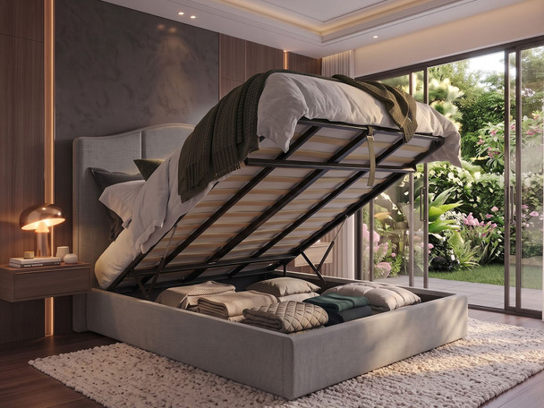 Bruno Ottoman Storage Bed in Steel Grey Atlanta fabric with the mattress base lifted, revealing the internal under-bed storage area.