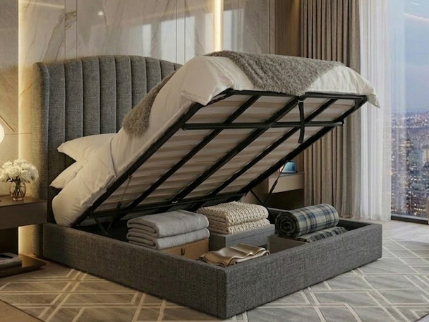 Grey fabric Jimena Ottoman Bed fully open, displaying the smooth gas-lift front-opening storage system and ample space inside the sturdy reinforced frame