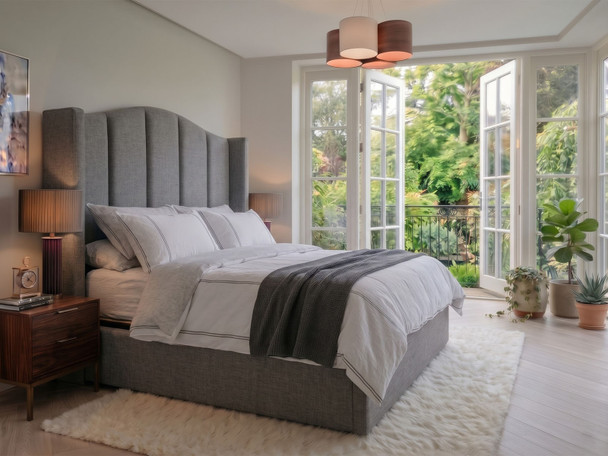 Jimena wingback ottoman storage bed in Steel Atlanta Soft Teddy, side view showing the curved wingback headboard and upholstered base