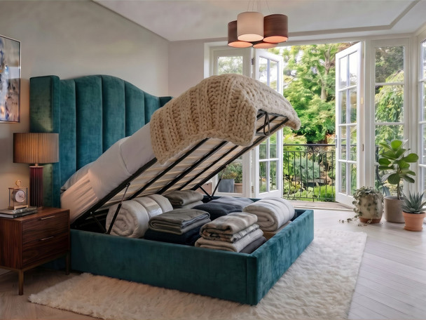 Jimena wingback ottoman storage bed in Teal Atlanta Soft Teddy with the gas-lift base open, showing the large storage area underneath
