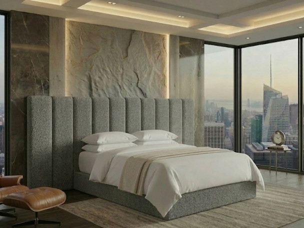 Close-up of the Elvira grey fabric king size bed featuring a tall fluted headboard