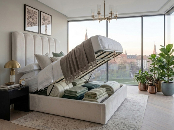 Cream velvet Bella Bubble Ottoman bed with the mattress platform lifted, displaying the full-sized, front-opening storage area and sturdy internal solid base boards
