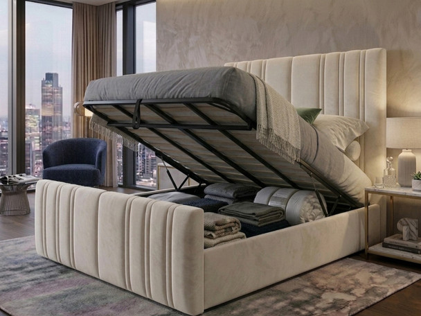 Cream velvet Selva Ottoman Storage Bed Frame shown in the open position, demonstrating the effortless gas-lift system and spacious solid wood base storage compartment