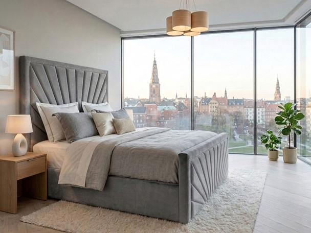 Full view of the Arcadia Ottoman Storage Bed Frame upholstered in grey velvet, showcasing its imposing fluted headboard and matching low-profile footboard