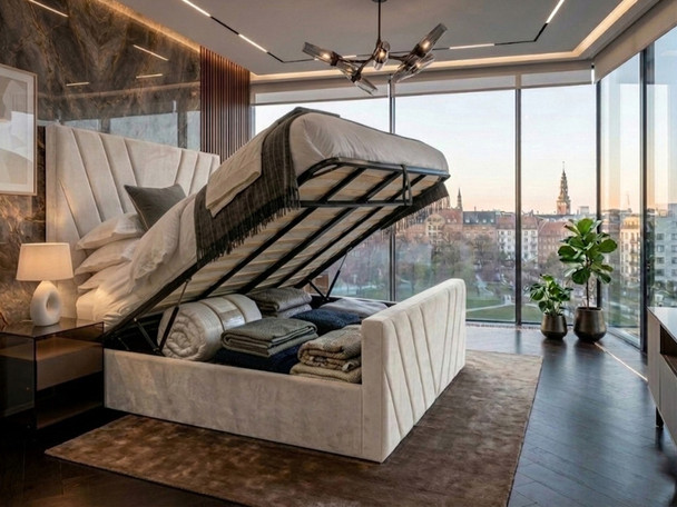 Carmela Ottoman bed in cream velvet shown with the gas-lift base raised, revealing a spacious, solid-base under-bed storage area