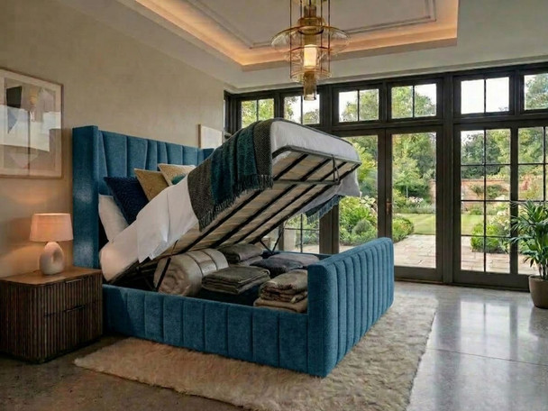 Teal Atlanta Soft Teddy Chelo wingback ottoman bed lifted open on gas-lift struts to show the large storage space with a solid base
