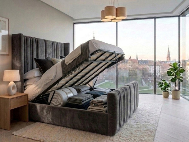 Luisina ottoman storage bed in charcoal grey velvet with the gas-lift base raised, revealing the spacious under-bed storage area