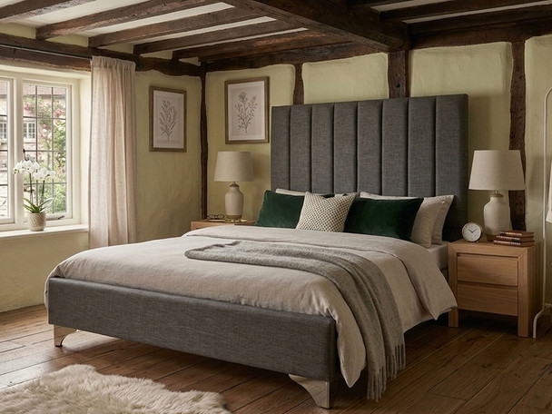 Zofia upholstered bed frame in durable charcoal linen fabric, featuring a sophisticated tall fluted headboard and clean low-profile footboard