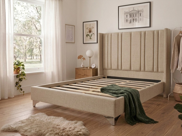 A beige linen upholstered bed frame empty of a mattress, revealing the internal construction of thick solid wooden slats and a central support bar for maximum stability.