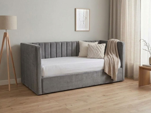 Aera guest daybed sofa upholstered in grey smooth velvet fabric and styled with simple bedding