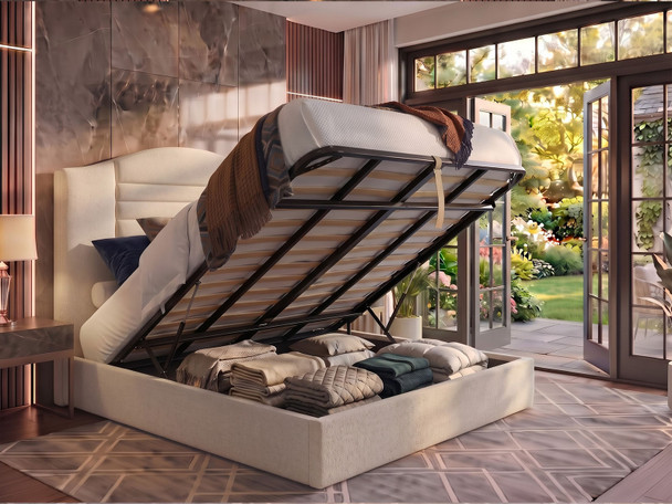 Haven Ottoman Storage Bed Frame lifted open to reveal the spacious under-bed storage area, upholstered in ivory cream Atlanta fabric with a fluted, curved headboard in the background.