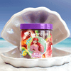 Candy Club's Disney Princess Ariel candy cup stylized in a ceramic seashell.
©Disney.