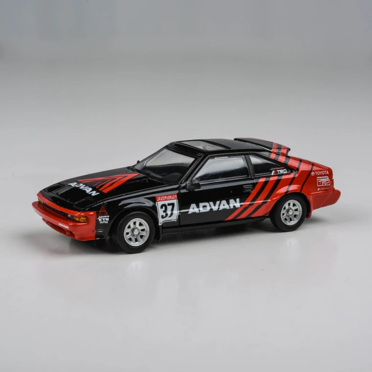 Paragon # PA55445 1/64 1984 Toyota Celica Supra ADVAN