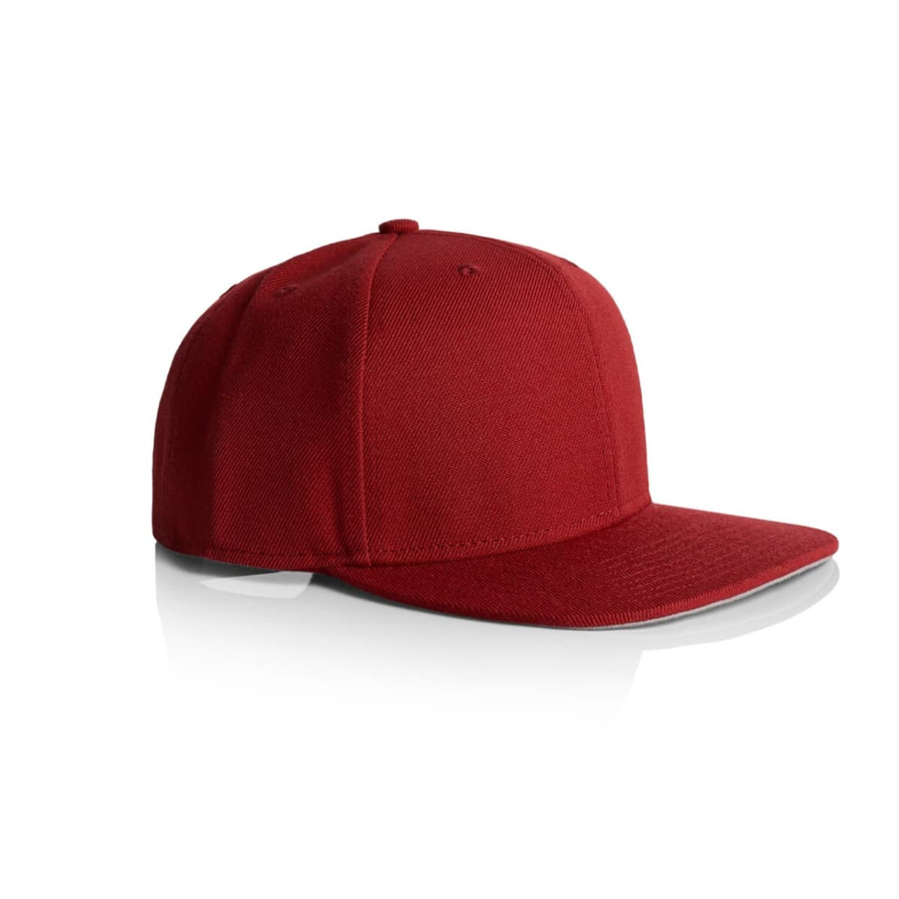 A red cap with a flat brim and structured design, featuring a logo on the front.