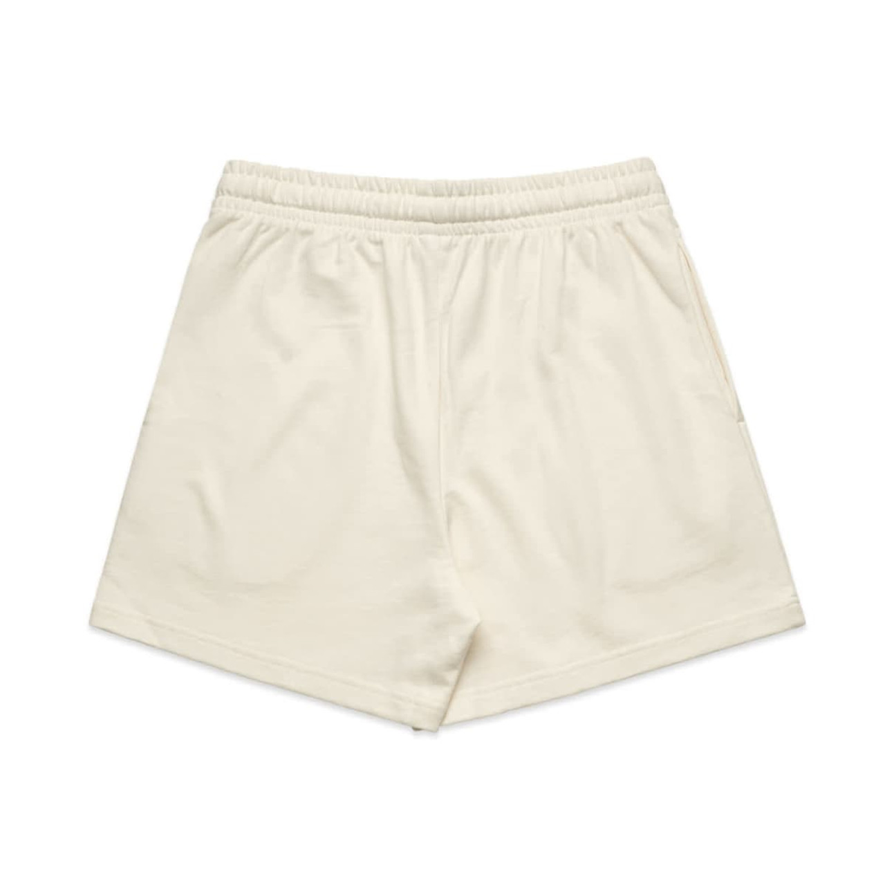 Cream-coloured sports shorts with an elastic waistband and a side pocket, featuring a logo.