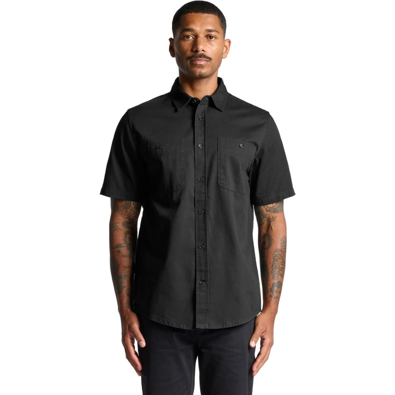 A black short-sleeved work shirt featuring a button-up front and two chest pockets. The shirt has a logo.