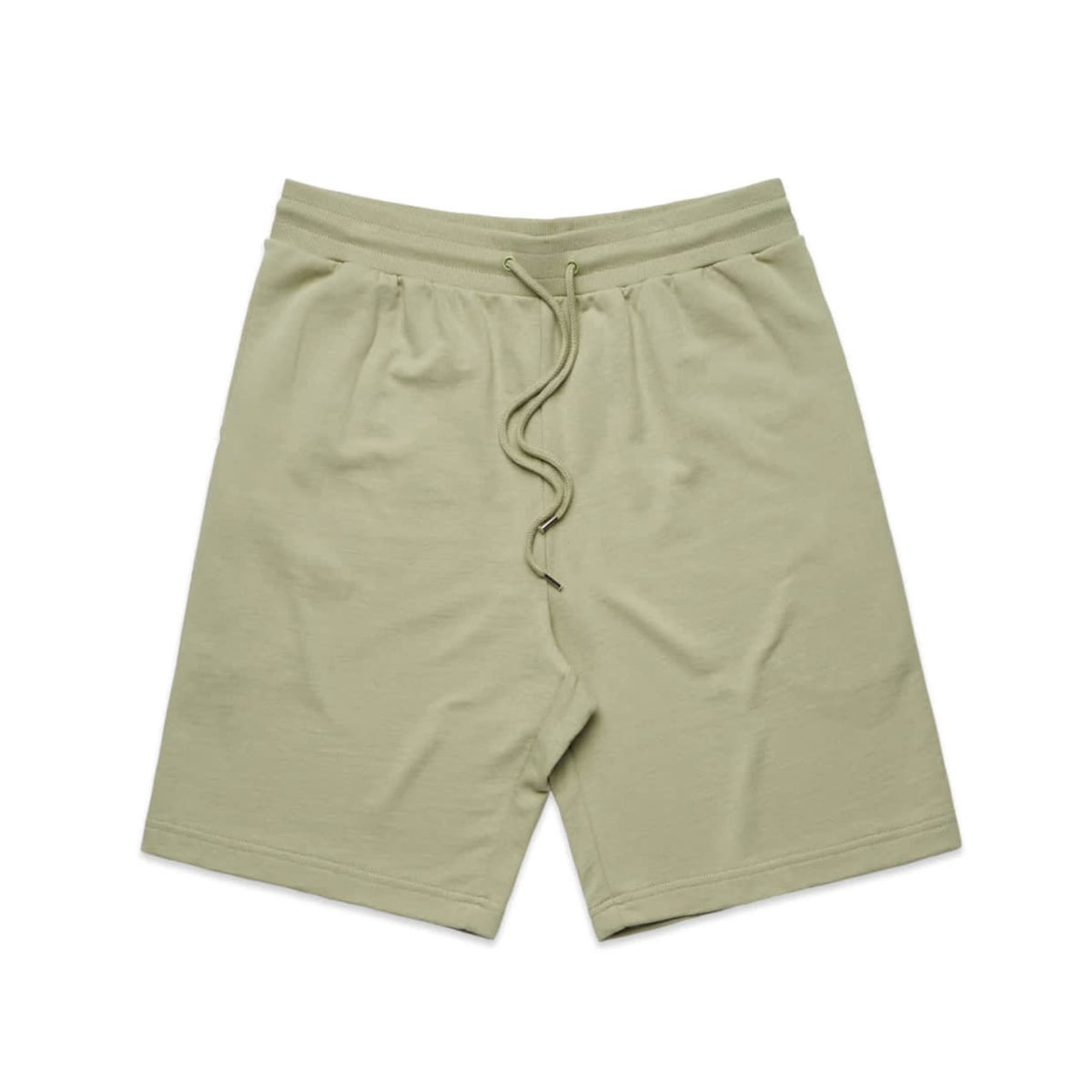 Light green sports shorts with an elastic waistband and drawstring, featuring a logo.