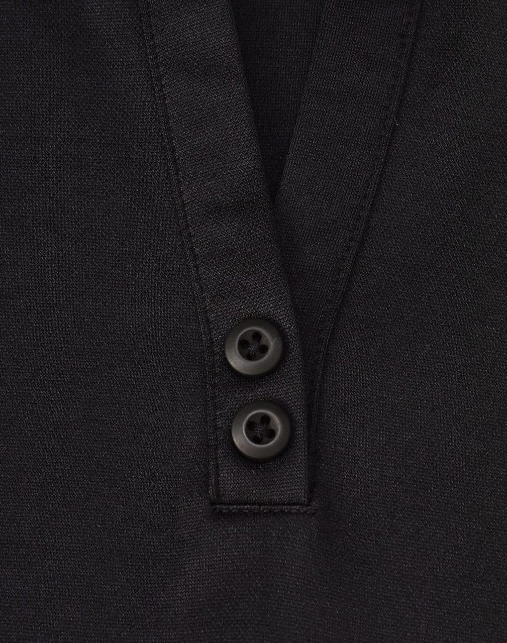 A black short-sleeve polo shirt featuring a placket with two buttons and a logo.