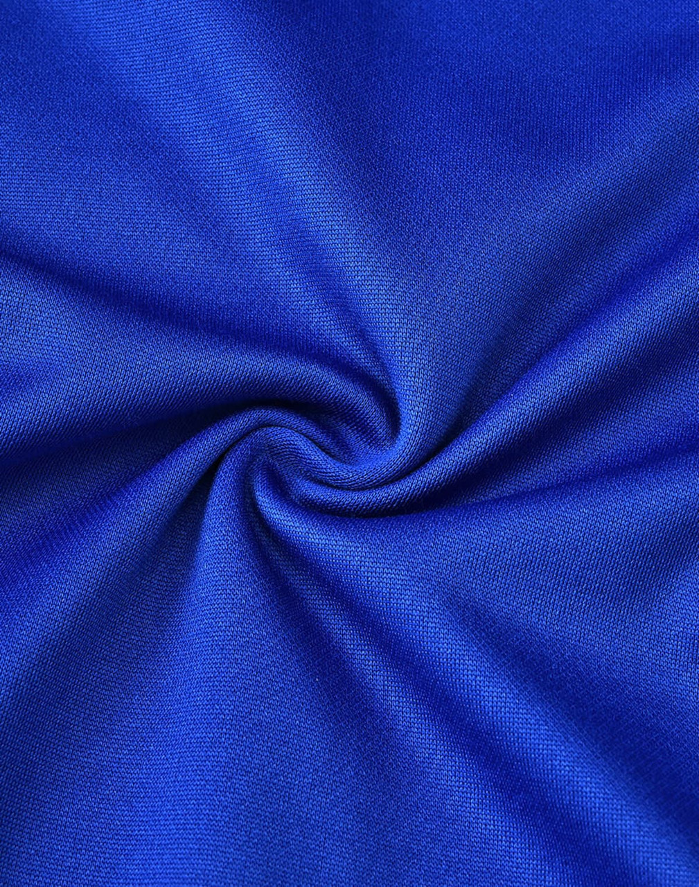 A close-up of smooth, vibrant royal blue fabric with a subtle texture, ideal for polo shirts.