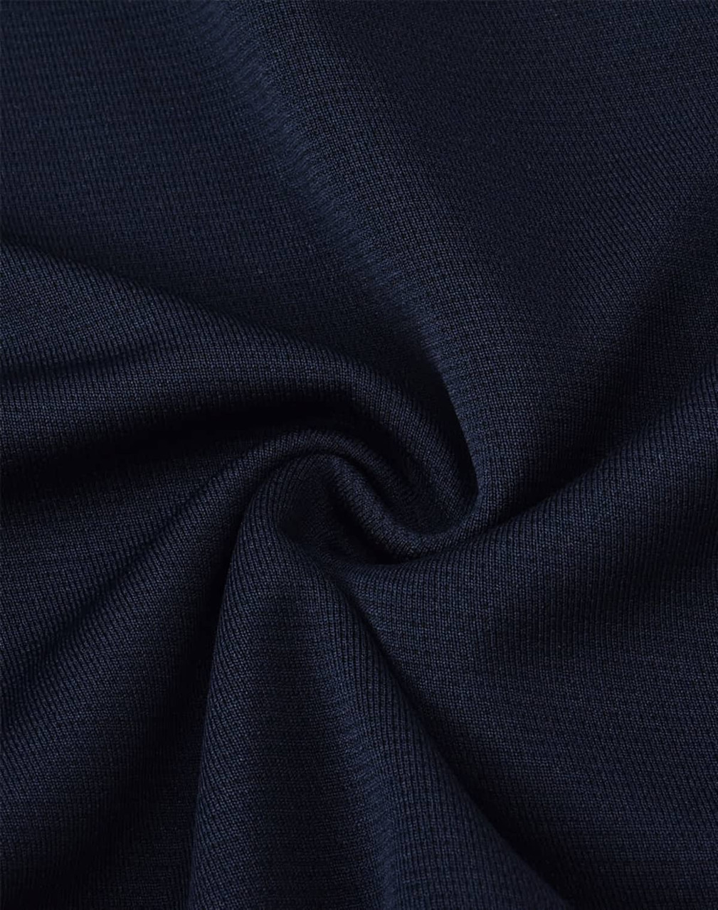A close-up of navy fabric, featuring a smooth, textured finish, suitable for adults' sports shorts.