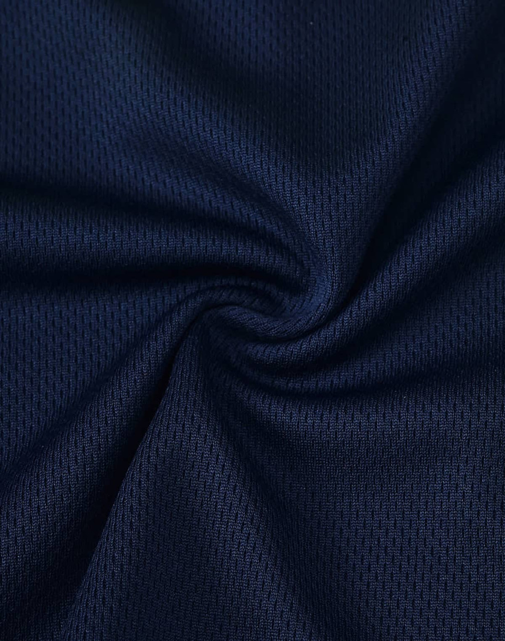 A close-up of navy fabric with a textured mesh pattern, suitable for polo shirts. The image features a logo.