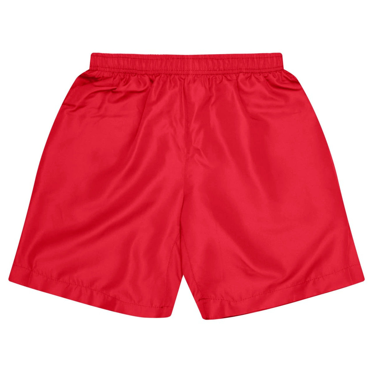 Red sports shorts for kids with an elastic waistband and a smooth finish. Features branding on the side.