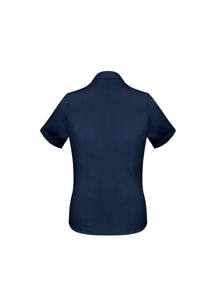 A navy blue women's short sleeve button-up shirt, featuring a smooth fabric and rolled sleeves.