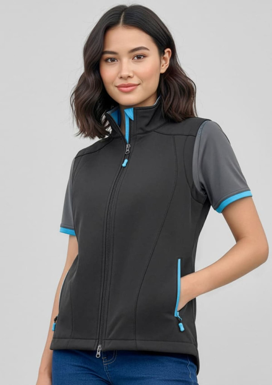 A black women's vest with blue accents, featuring a zip front and side pockets, worn with a short-sleeved top.