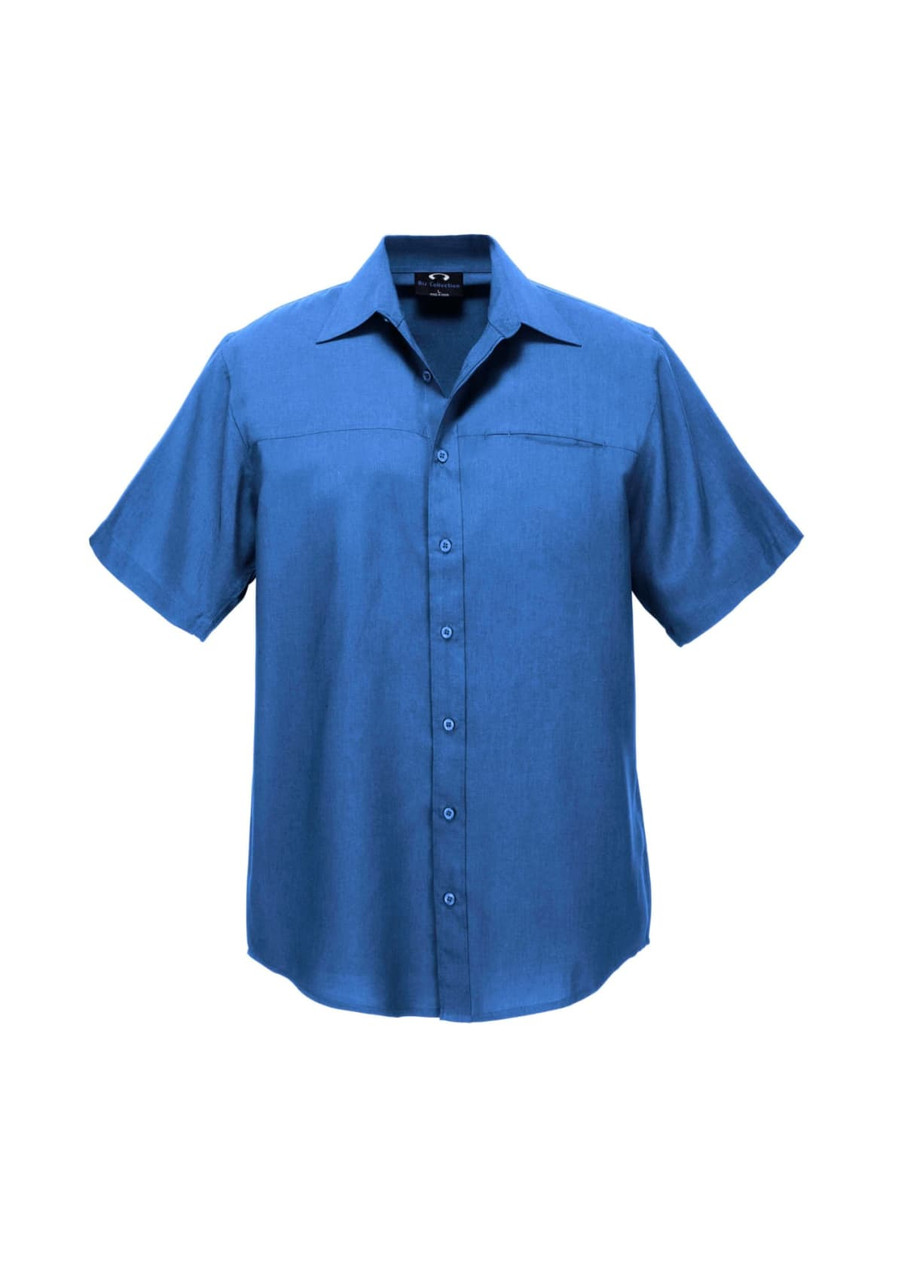 A short-sleeve button-up shirt in a vibrant blue colour, featuring a front pocket and brand logo.