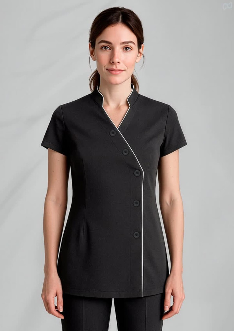 A black women's crossover tunic with short sleeves and white piping details, featuring a button closure.