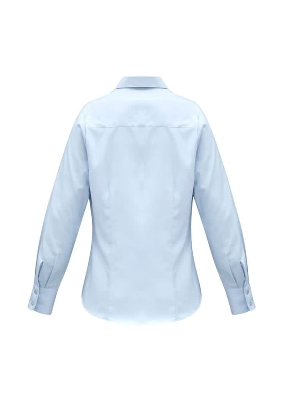 A light blue women's long sleeve button-up shirt with a classic collar and cuffed sleeves. Features a logo.