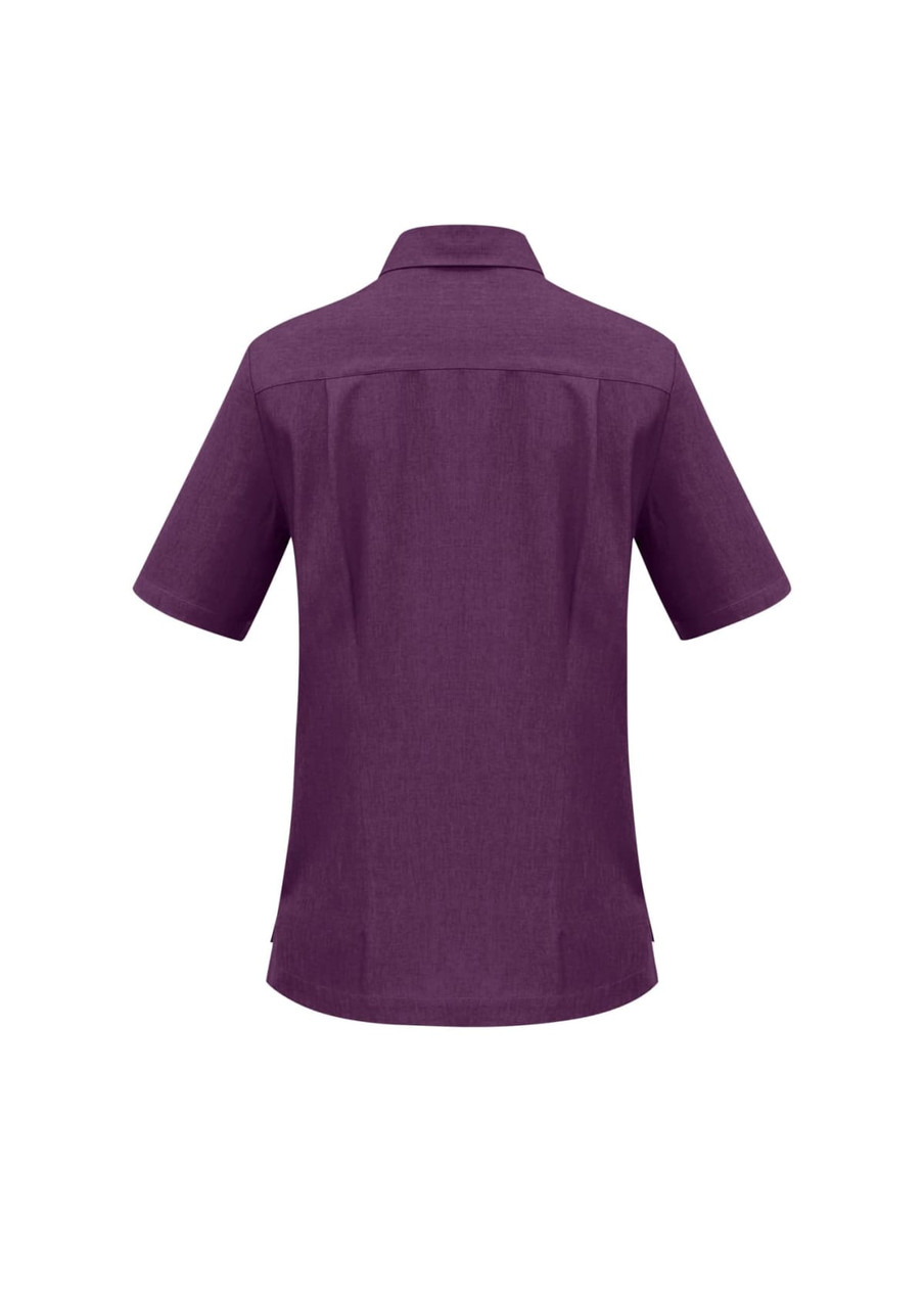 A short-sleeved purple overblouse with a collar and subtle seam detailing, featuring a logo.