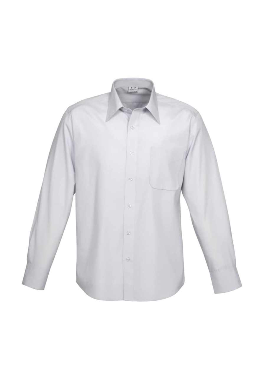 A white button-up shirt with long sleeves featuring a pocket and a collar. Includes a logo on the collar.