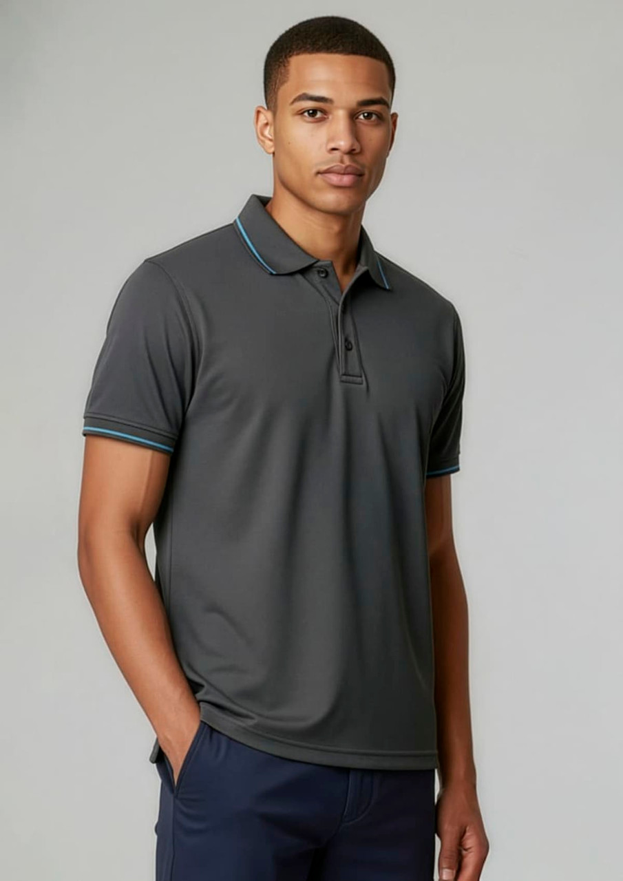 A men's short sleeve polo shirt in dark grey, featuring a collar and contrasting trim. It has a logo on the chest.