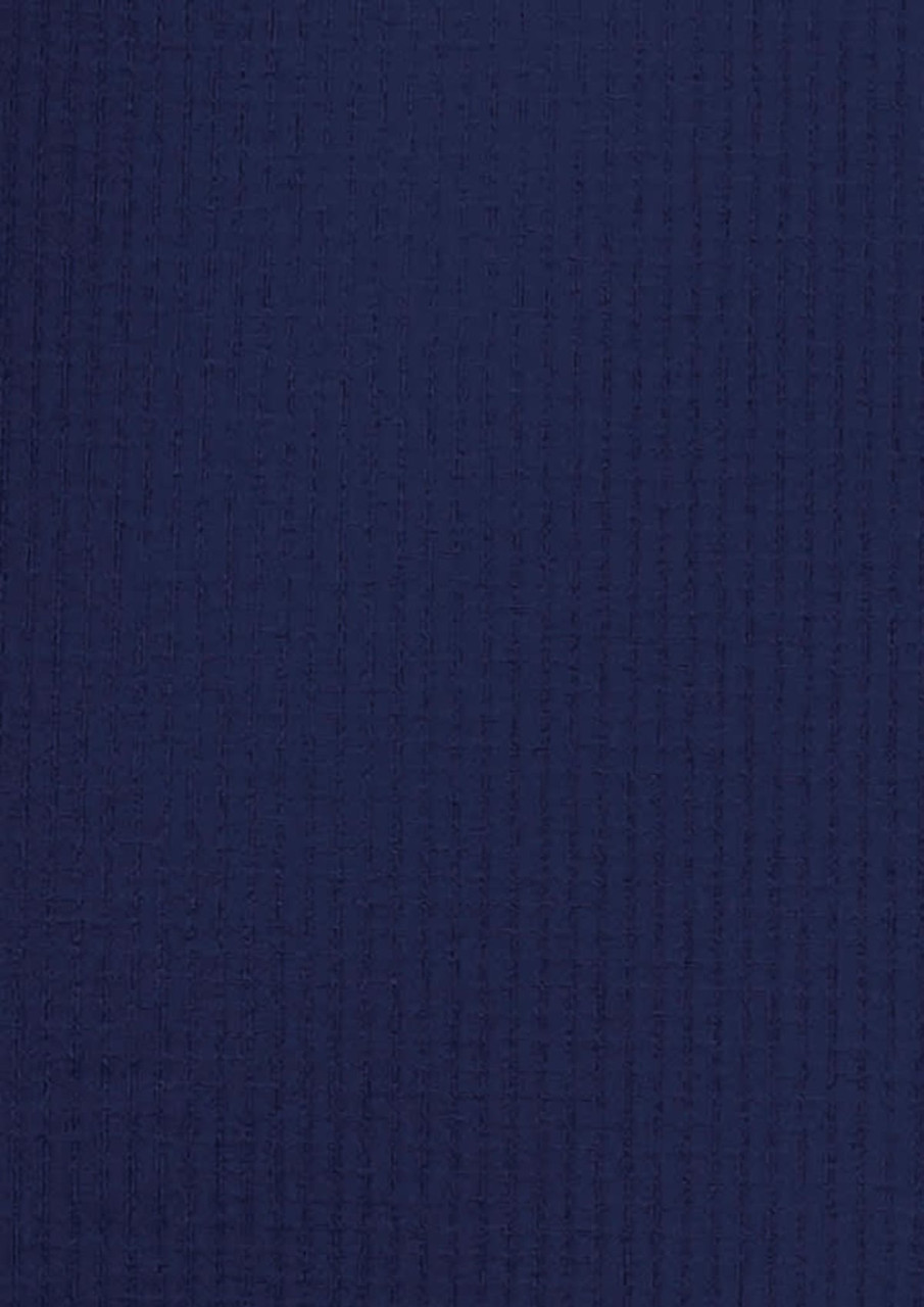 A navy blue short sleeve button-up shirt with a textured fabric, featuring a logo.