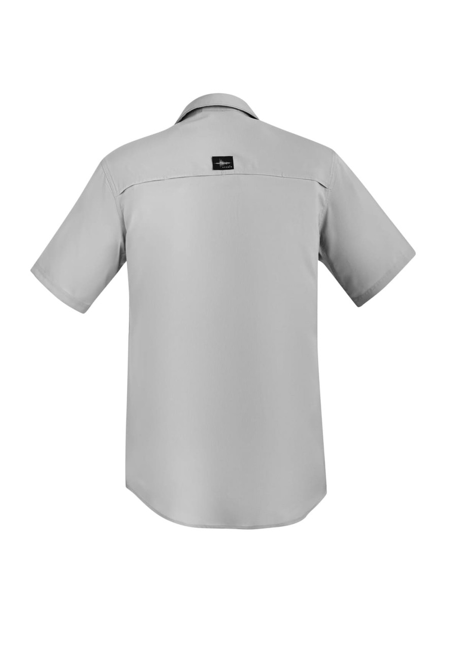 A light grey short sleeve button-up shirt featuring a back yoke and a logo on the upper back.