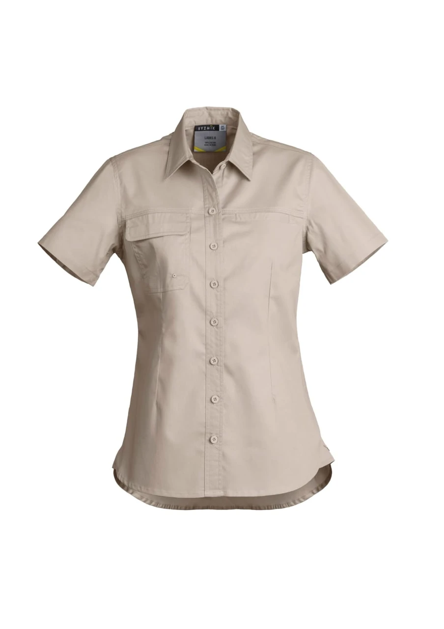A women's lightweight short sleeve shirt in beige, featuring a button front and a chest pocket, with a logo.