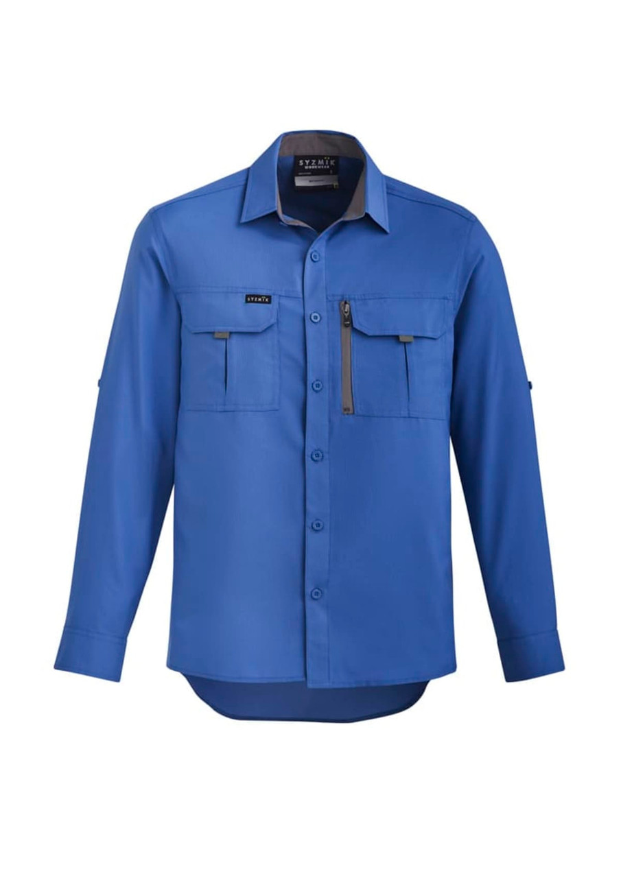 A blue long sleeve button-up shirt featuring two chest pockets and a zippered pocket, with a logo on the front.