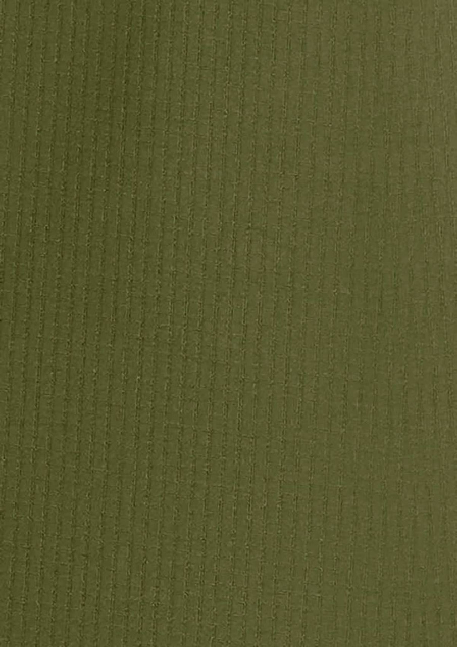 A long sleeve shirt in olive green with a ribbed texture, featuring a logo on it.