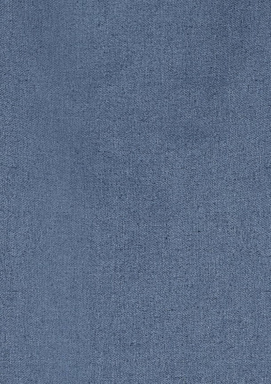 A textured fabric swatch featuring a medium blue colour, suitable for a shirt. The material looks soft and versatile.